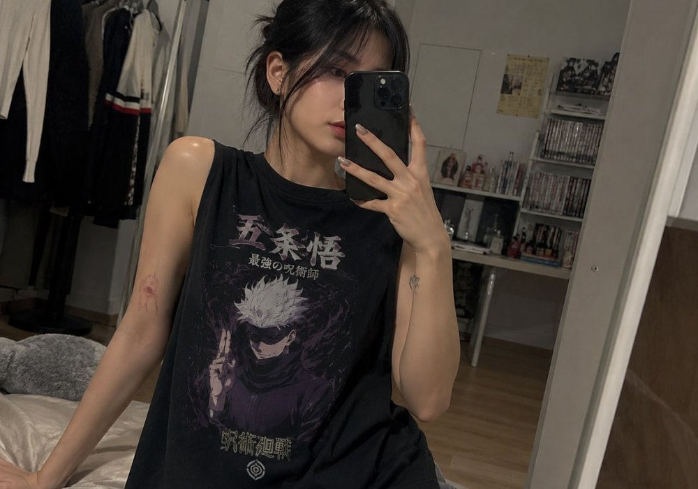 Black Jujutsu Kaisen Gojo tank top worn indoors
